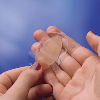 Hydrocolloid layer covered with polyurethane foil